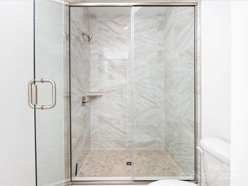 Walk-In Tiled Primary Shower Walk-In Tiled Primary Shower