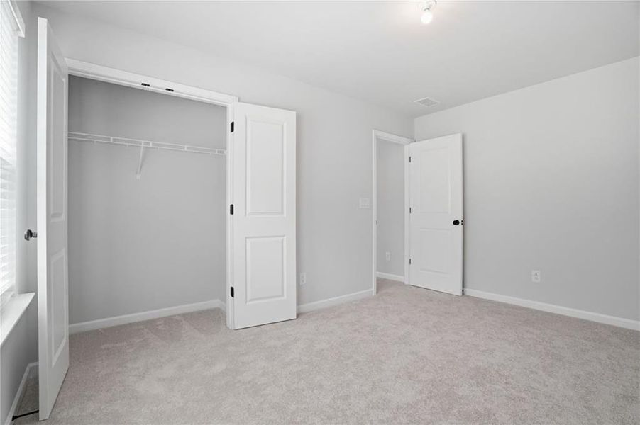 Spacious, unfurnished interior of a new home in Berkeley Mill, Cumming (Image 37).