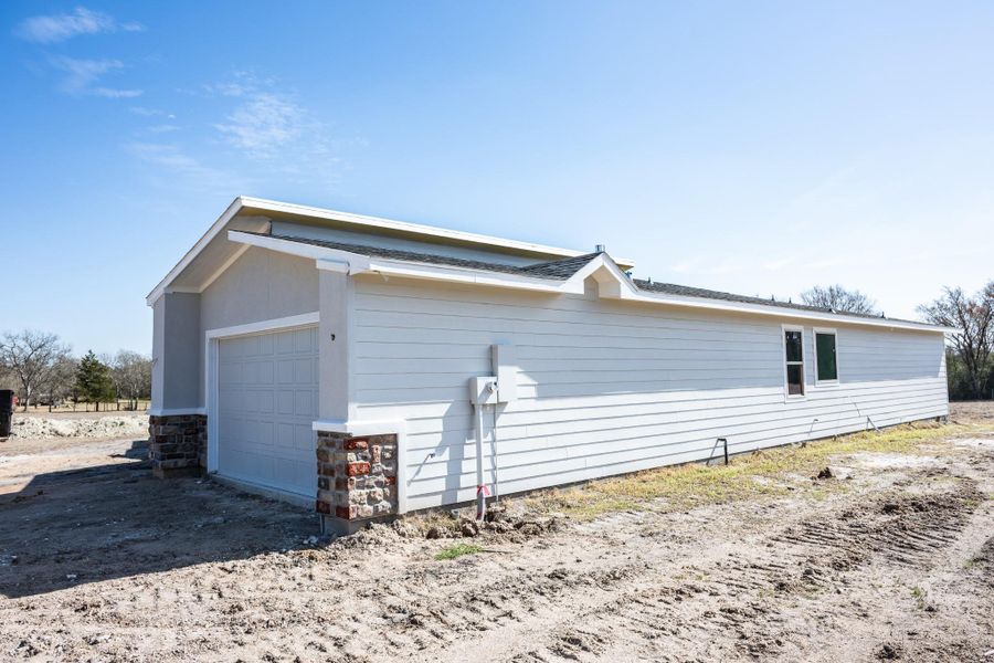 Exterior details and patio area of a home in , Huntsville (Image 3).
