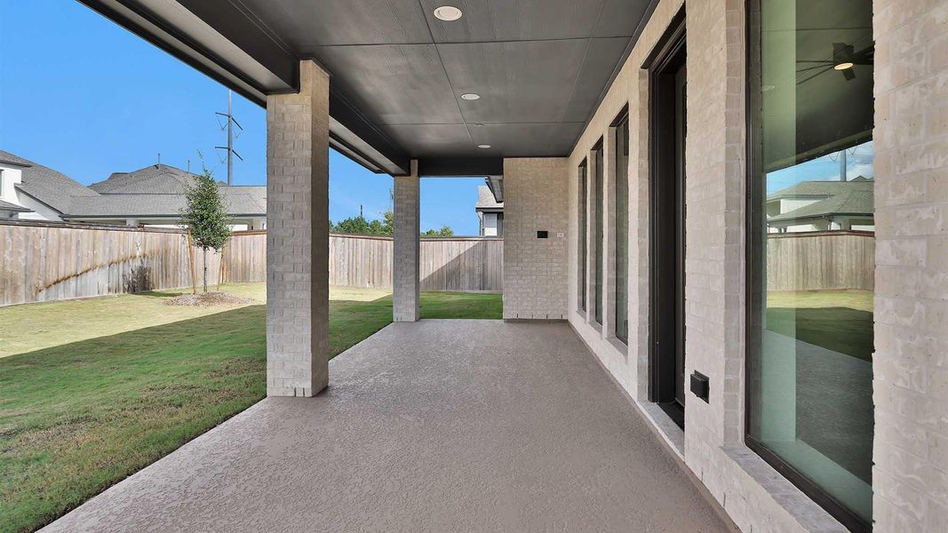 Exterior details and patio area of a home in Bridgeland 55', Cypress (Image 2).