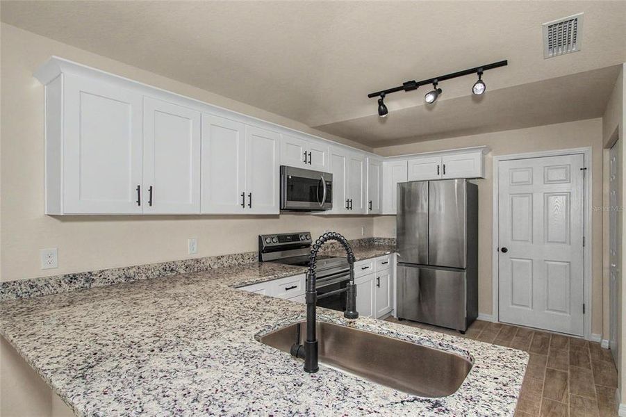 Furnished interior view inside a new home in , Ocala (Image 11). Furnished interior view inside a new home in , Ocala (Image 11).