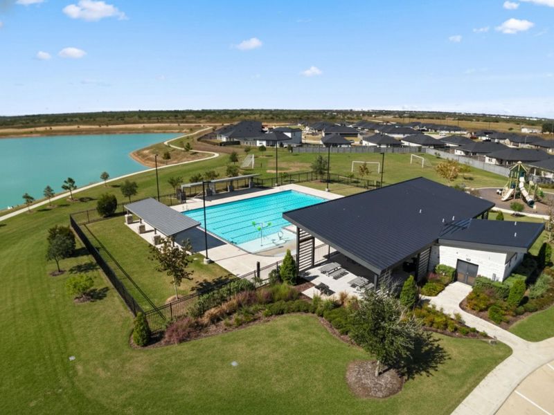 Enjoy access to swimming pools, playgrounds, and a clubhouse for resort-style living. Enjoy access to swimming pools, playgrounds, and a clubhouse for resort-style living.
