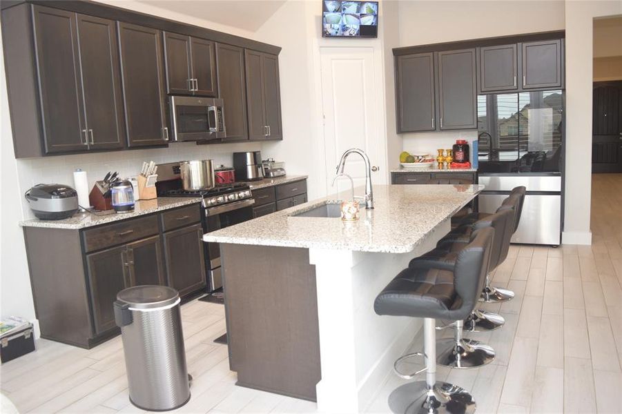 Furnished interior view inside a new home in , Hickory Creek (Image 11).