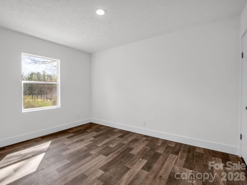 Spacious, unfurnished interior of a new home in , East Flat Rock (Image 26).