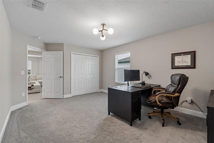 Furnished interior view inside a new home in Whispering Oaks Preserve, Wesley Chapel (Image 8).