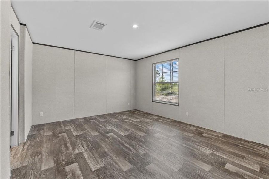 Spacious, unfurnished interior of a new home in , Fort McCoy (Image 25).