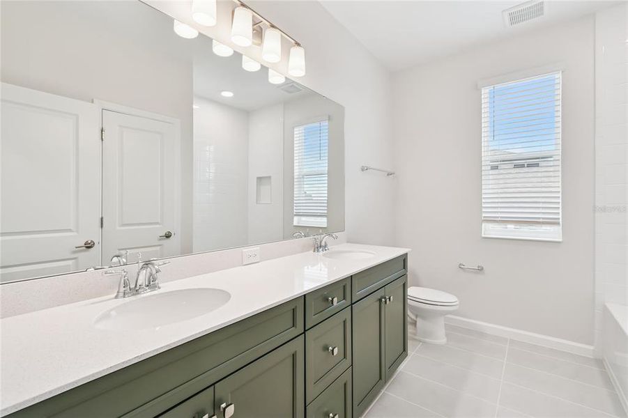 Furnished interior view inside a new home in Emerson Pointe, Apopka (Image 16).