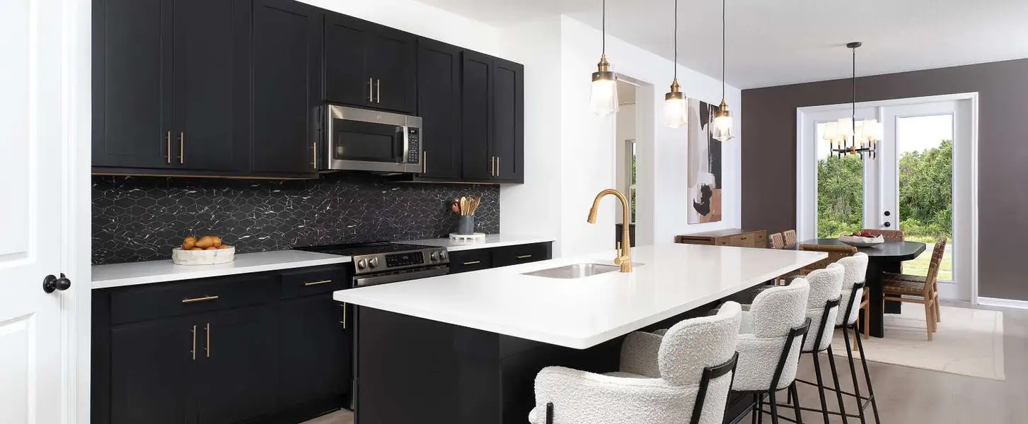 Representative furnished interior of a home built from the Badland by Ashton Woods in Catamaran Cove Traditional, Rockledge (Image 5).