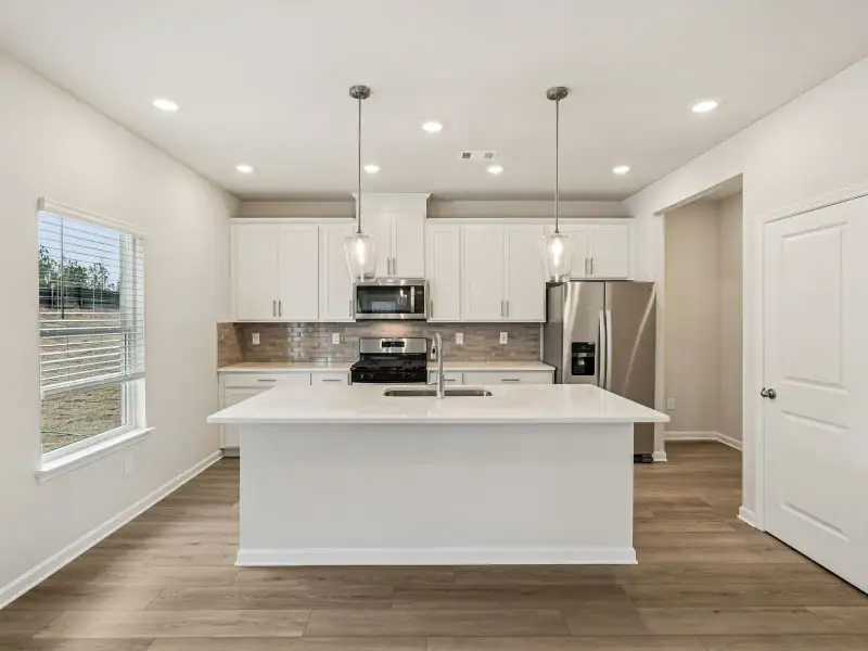 Furnished interior view inside a new home in Harmony Manor, Fairburn (Image 5).