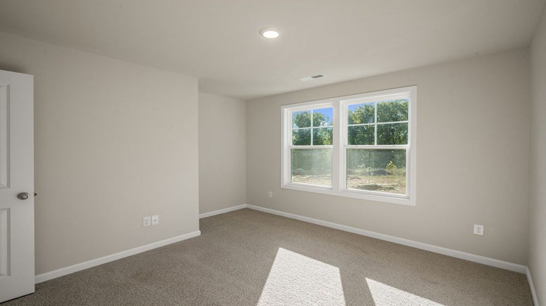 Spacious, unfurnished interior of a new home in The Grove at Glennview, Kernersville (Image 16).