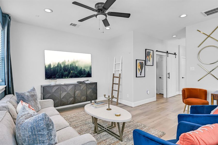 This upstairs lounge was made for entertaining with enough room for oversized seating, gaming, or late night conversations after the beach. It adds an entirely new layer of functionality to the home.