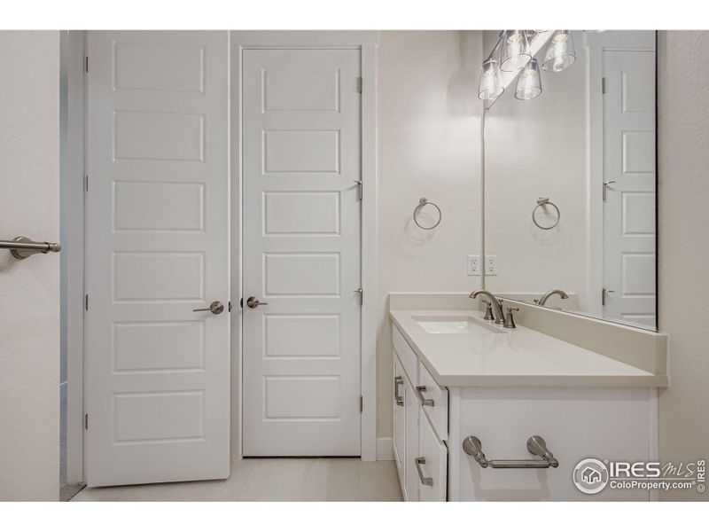 Furnished interior view inside a new home in RainDance National 60/70, Windsor (Image 9).