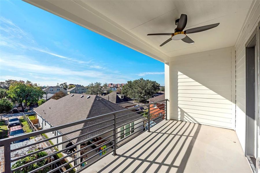 The oversized balcony right off the flex space is a great space to enjoy the outdoors.