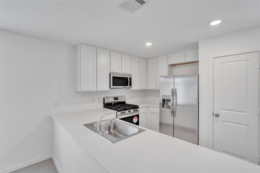 Furnished interior view inside a new home in Tavola: Cottage Collection, New Caney (Image 7).