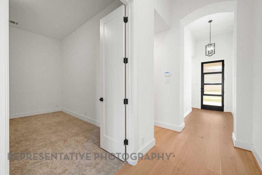 Spacious, unfurnished interior of a new home in Meridiana: 50ft. lots, Manvel (Image 16).