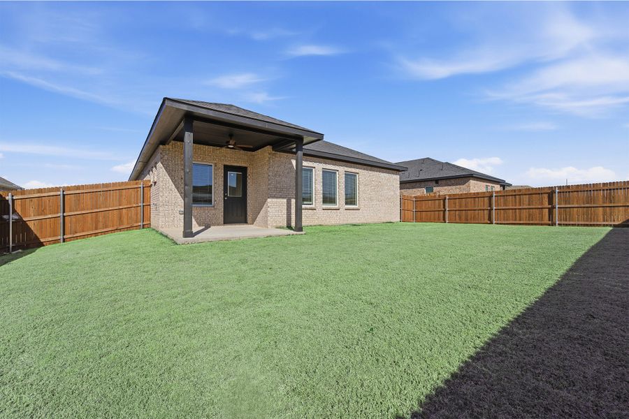 Exterior details and patio area of a home in Pebblebrook, Sherman (Image 3).