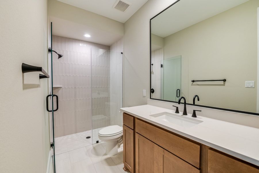 Representative furnished interior of a home built from the Sapphire by Giddens Homes in Riverstone, Georgetown (Image 44).