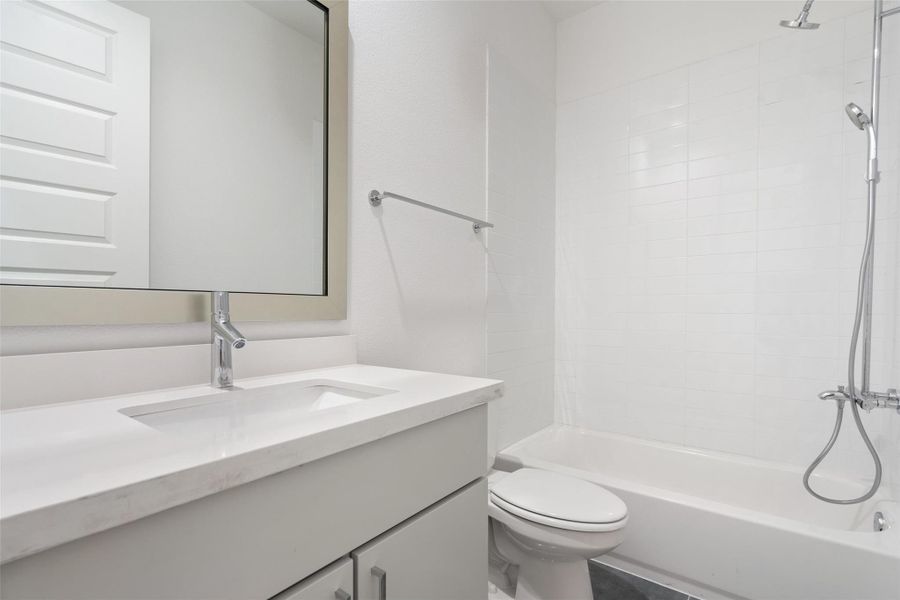 Full bathroom featuring vanity and shower / bathtub combination
