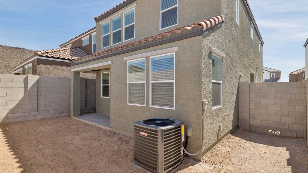 Exterior details and patio area of a home in The Buttes at Mystic, Peoria (Image 25).