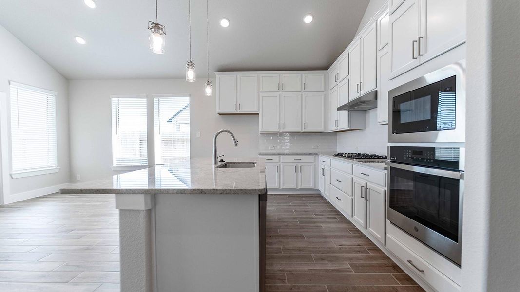 Furnished interior view inside a new home in Sunterra, Katy (Image 2).