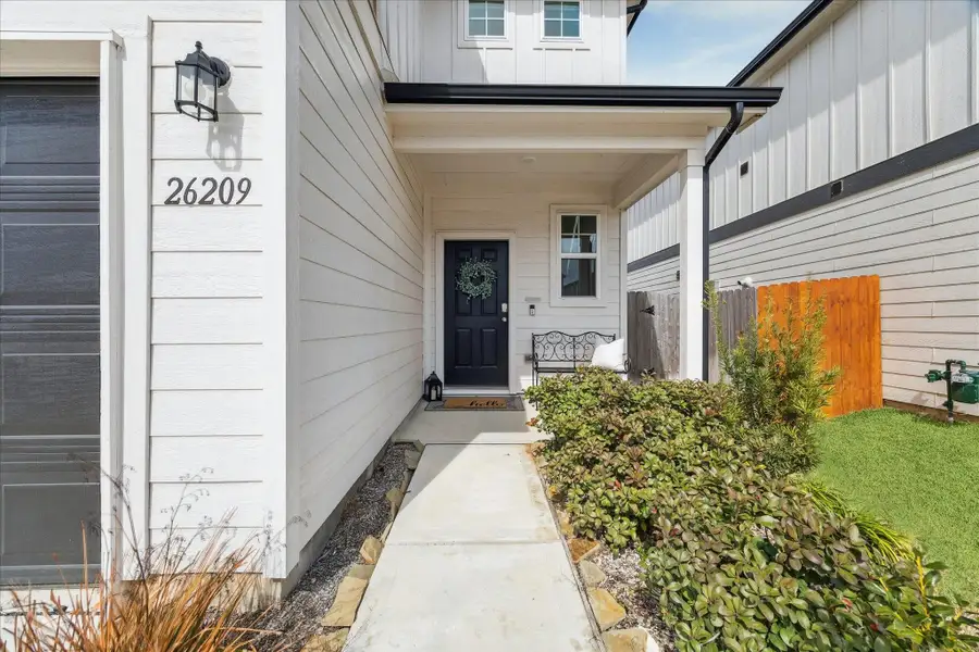 Exterior details and patio area of a home in Decker Farms, Magnolia (Image 3).
