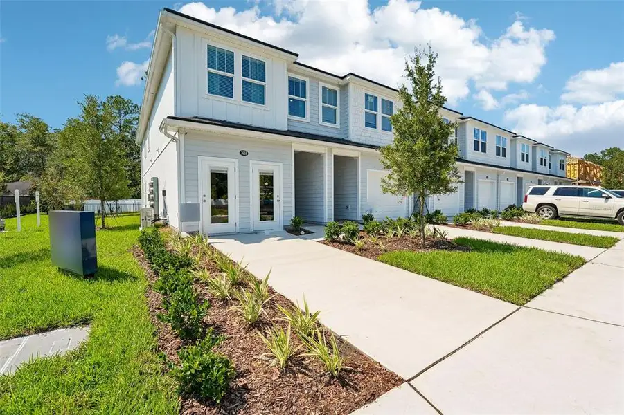 Front exterior of a new home in , Jacksonville, FL, highlighting curb appeal (Image 1). Front exterior of a new home in , Jacksonville, FL, highlighting curb appeal (Image 1).