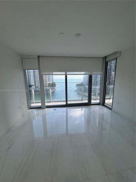 Spacious, unfurnished interior of a new home in Aston Martin Residences, Miami (Image 55).