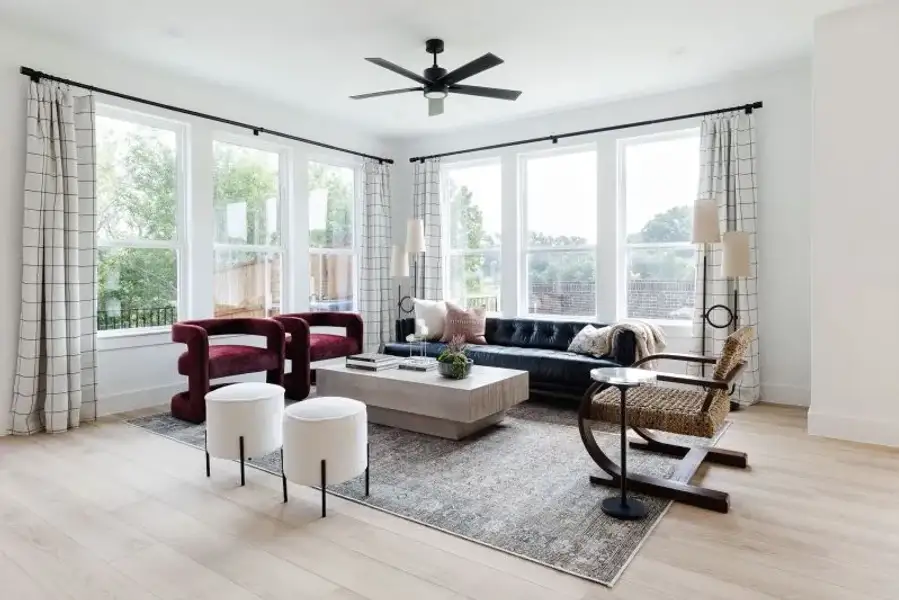 Furnished interior view inside a new home in The Preserve on the Park, Addison (Image 8).