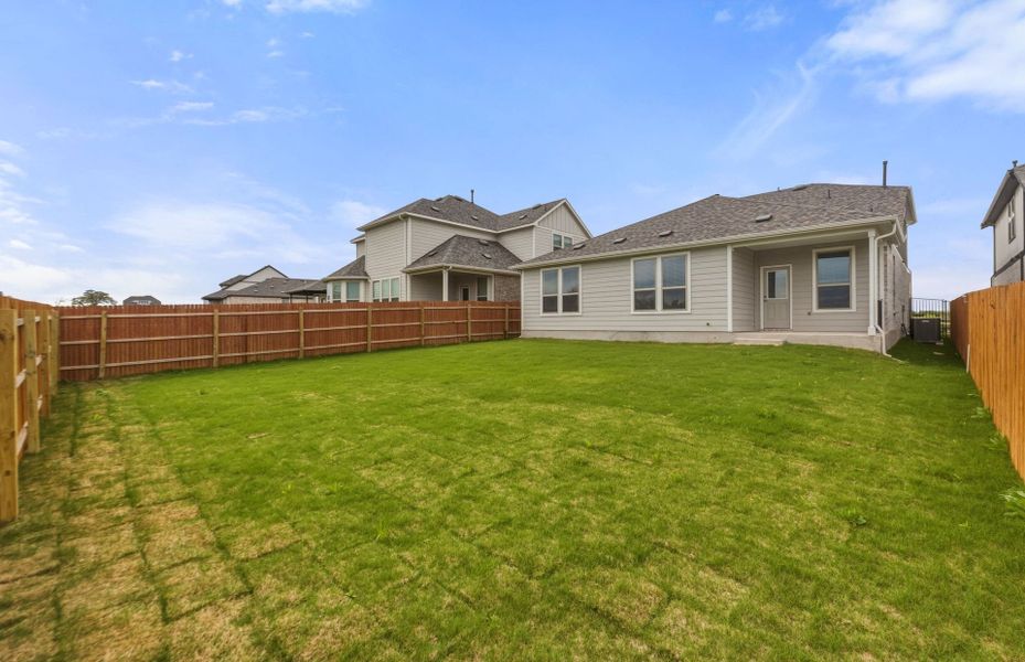 Exterior details and patio area of a home in Saddleback at Santa Rita Ranch, Liberty Hill (Image 30).