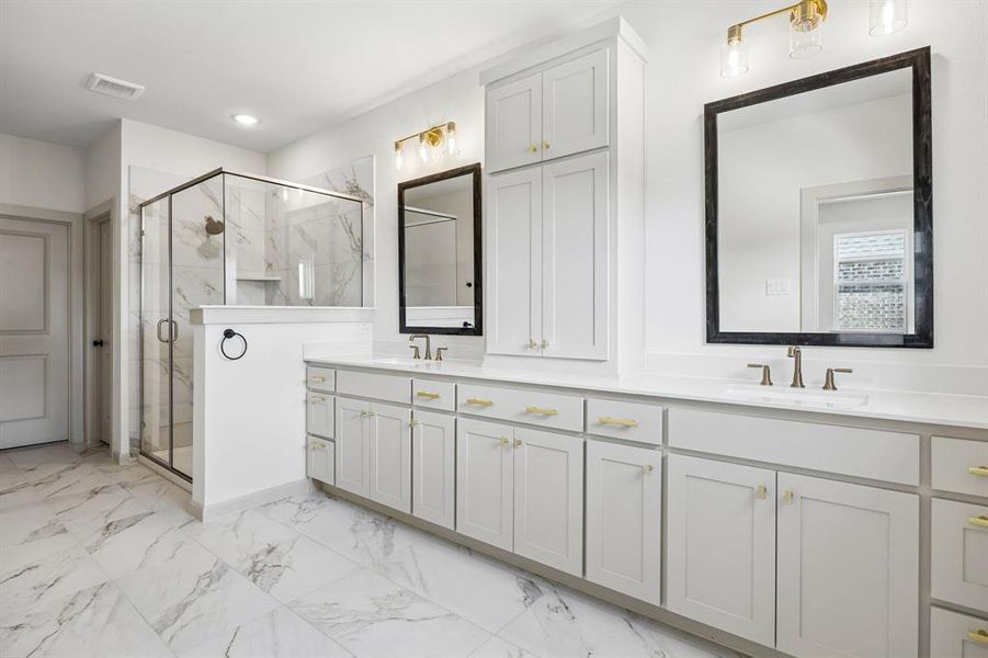 Filled with style, sophistication and space, this fantastic Owner's bath was built for two!