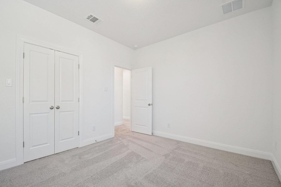 Spacious, unfurnished interior of a new home in 6 Creeks, Kyle (Image 28).
