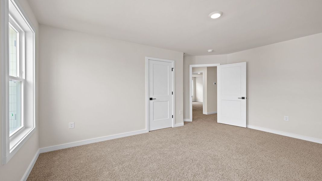 Spacious, unfurnished interior of a new home in Adams Glen, Greenville (Image 26).