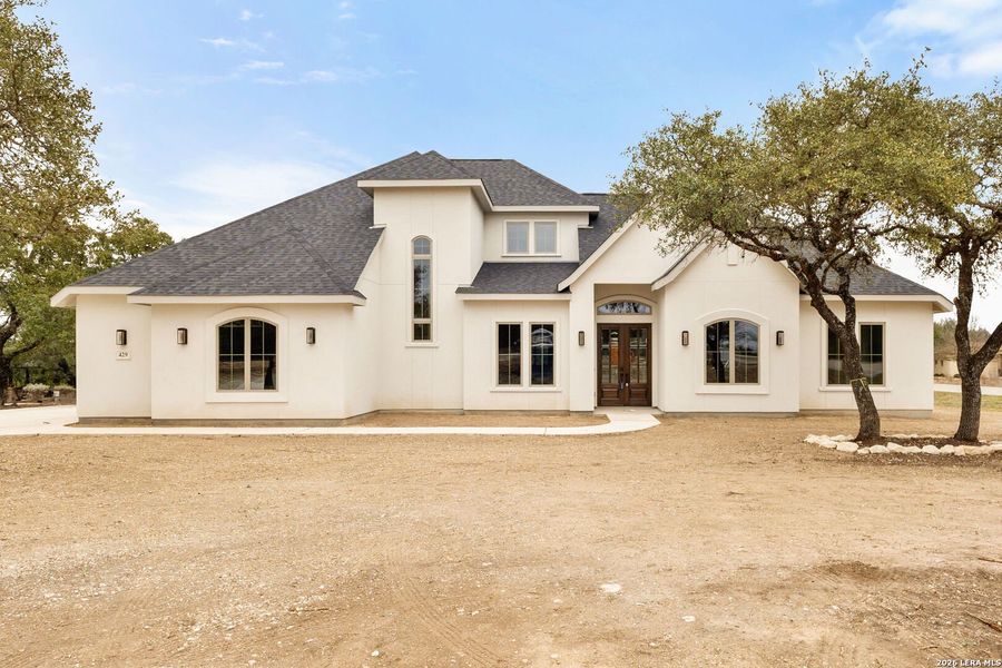 Front exterior of a new home in , Spring Branch, TX, highlighting curb appeal (Image 29).
