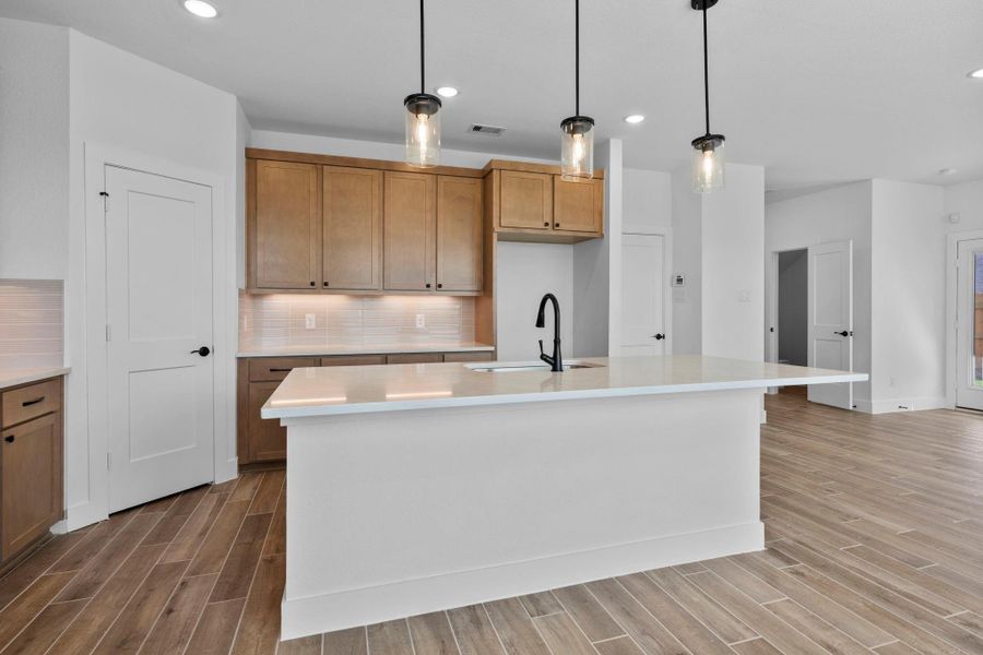 Furnished interior view inside a new home in Elyson, Katy (Image 7).