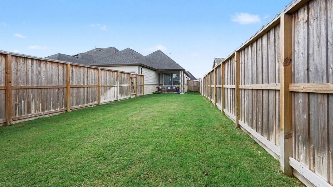Exterior details and patio area of a home in , Mont Belvieu (Image 24).
