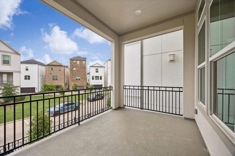 Spacious balcony offering the perfect spot to relax, unwind, and enjoy outdoor living.