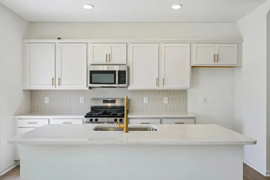 Furnished interior view inside a new home in Towns at The Point, Rolesville (Image 2). Furnished interior view inside a new home in Towns at The Point, Rolesville (Image 2).