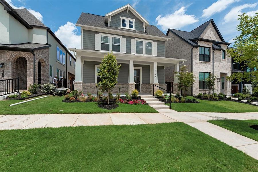 Front exterior of a new home in Fields - 40' Lots, Frisco, TX, highlighting curb appeal (Image 2). Front exterior of a new home in Fields - 40' Lots, Frisco, TX, highlighting curb appeal (Image 2).