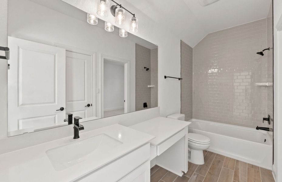 Representative furnished interior of a home built from the Wallace by Pulte Homes in Bluffview Reserve, Leander (Image 10).