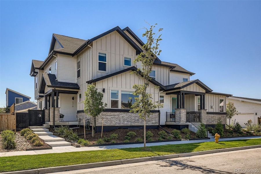 Front exterior of a new home in , Denver, CO, highlighting curb appeal (Image 1).
