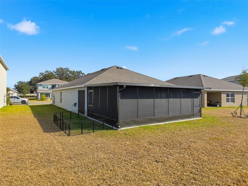 Exterior details and patio area of a home in Twisted Oaks, Wildwood (Image 24).
