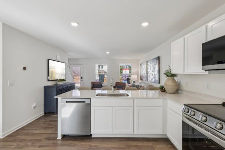 A kitchen with white cabinets. A kitchen with white cabinets.