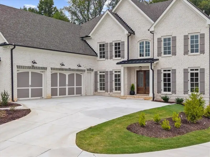 Front exterior of a new home in , Canton, GA, highlighting curb appeal (Image 28).