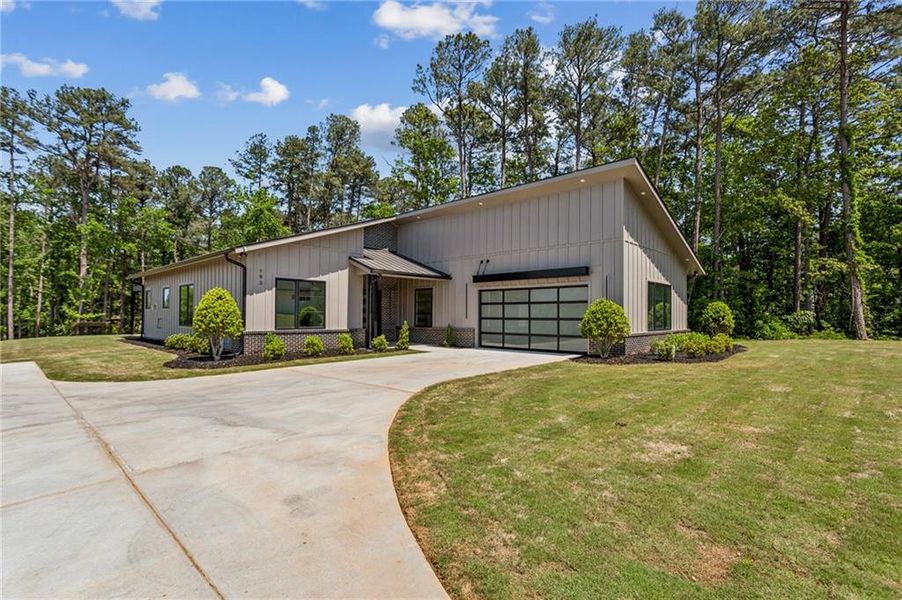 Front exterior of a new home in , Marietta, GA, highlighting curb appeal (Image 26).