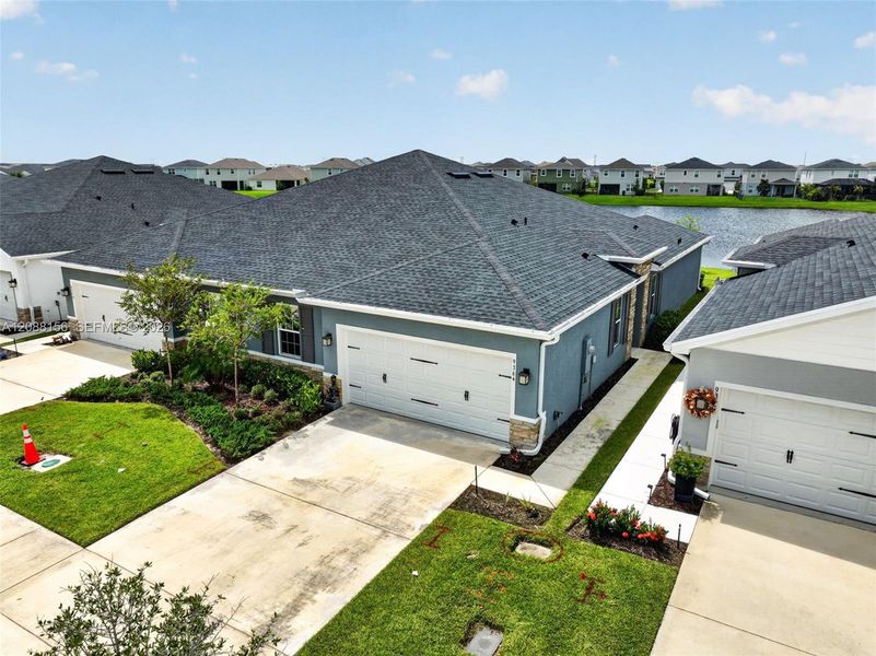 Front exterior of a new home in , Port St. Lucie, FL, highlighting curb appeal (Image 25). Front exterior of a new home in , Port St. Lucie, FL, highlighting curb appeal (Image 25).