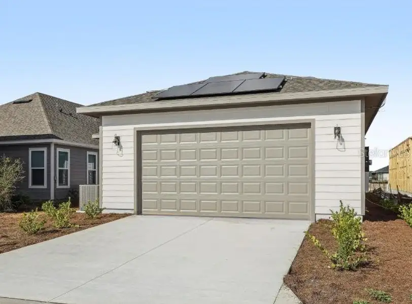 Front exterior of a new home in Weslyn Park Single Family, St. Cloud, FL, highlighting curb appeal (Image 6).