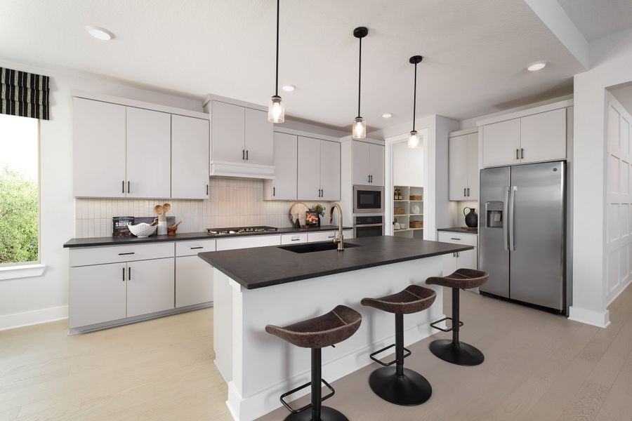 Image 9 representing the Emery by Tri Pointe Homes in Painted Tree, McKinney, TX.