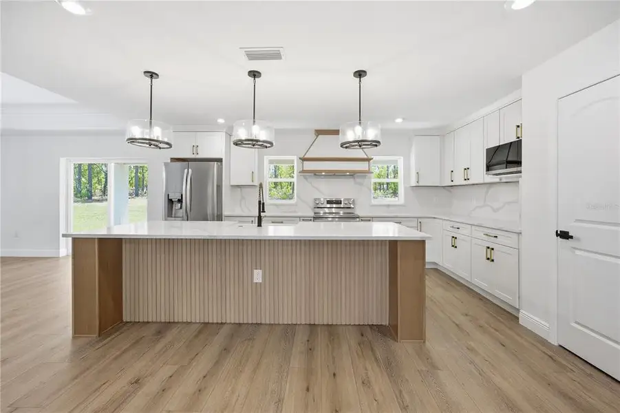 Furnished interior view inside a new home in , Ocala (Image 6).