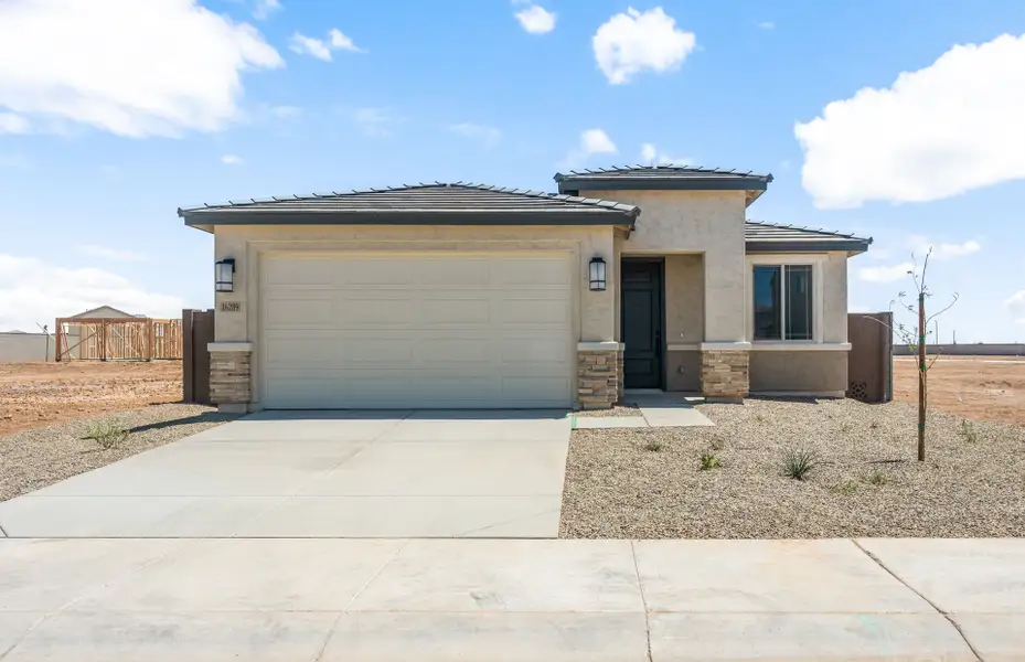 Front exterior of a new home in Soleo, San Tan Valley, AZ, highlighting curb appeal (Image 2). Front exterior of a new home in Soleo, San Tan Valley, AZ, highlighting curb appeal (Image 2).