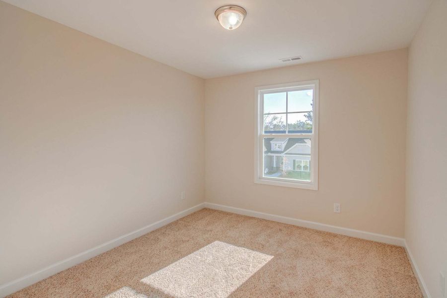 Representative unfurnished interior of a home built from the Drayton by Caviness & Cates Communities in Bartlett Manor, Youngsville (Image 239).